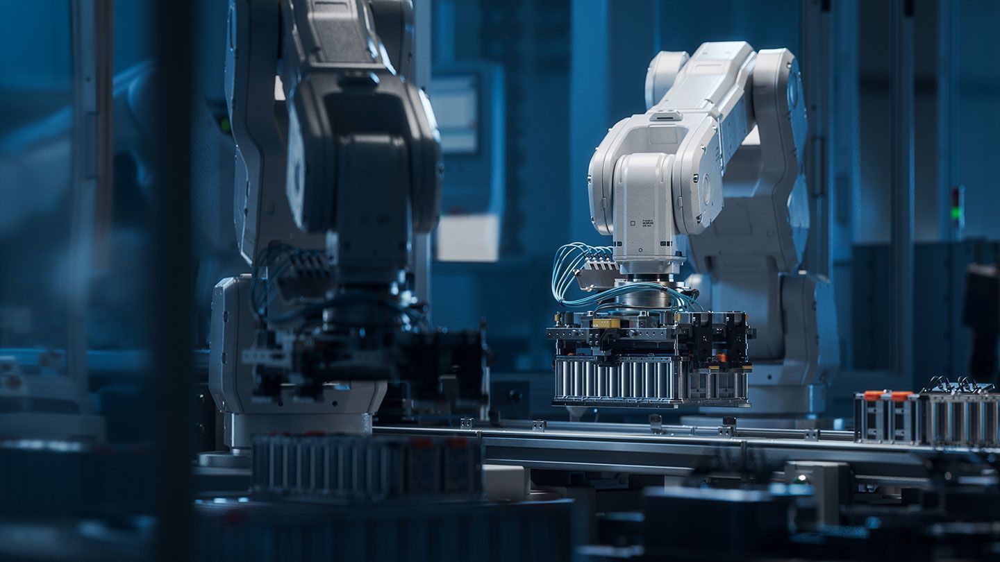 Industrial dark blue background with two robotic arms, one black and white working.